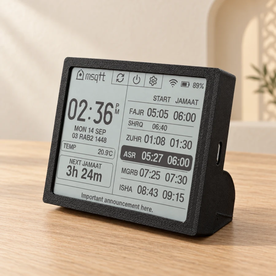 Black S100 Home Companion with an e-paper mosque timetable and desk stand